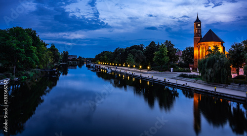 Salzufer mit Johanniskirche Brandenburg bei Nacht photo