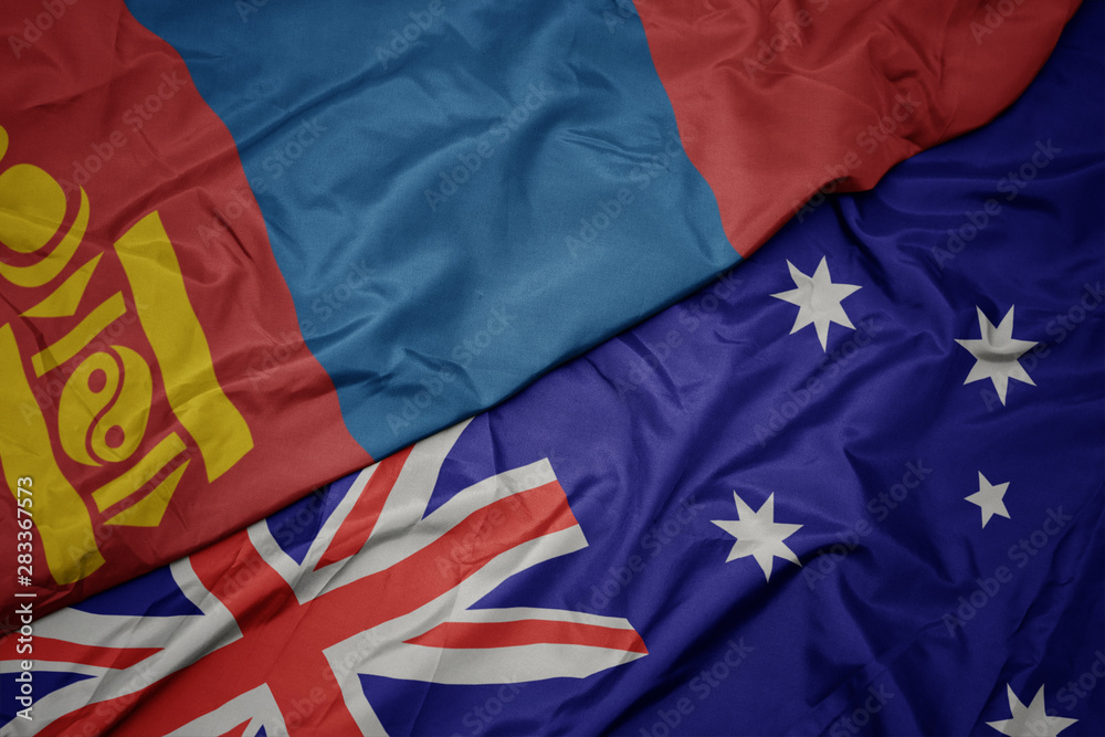 waving colorful flag of australia and national flag of mongolia. waving colorful flag of australia and national flag of mongolia.