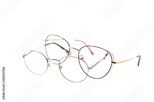 Two pairs of fashionable round eyeglass frames. Isolated