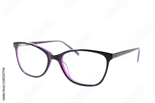 Dark pink stylish plastic frame glasses . Isolated