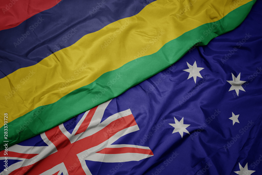 waving colorful flag of australia and national flag of mauritius. waving colorful flag of australia and national flag of mauritius.