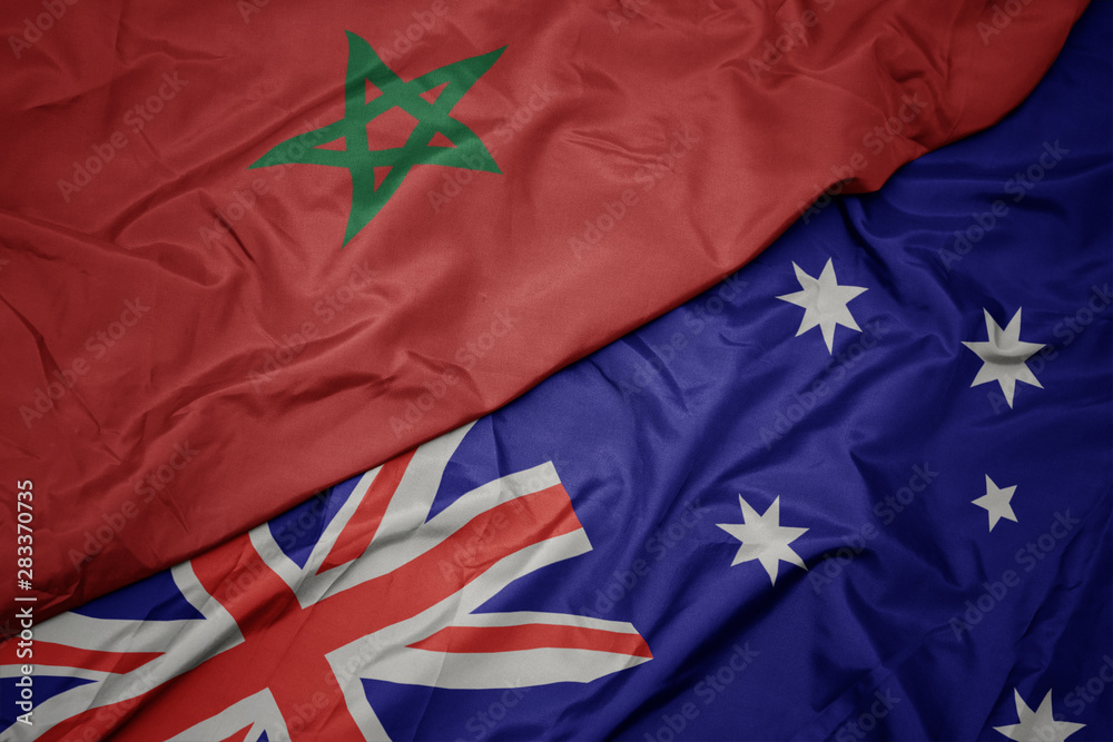waving colorful flag of australia and national flag of morocco. waving colorful flag of australia and national flag of morocco.