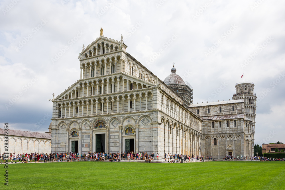 Panoramic view of Piazza dei Miracoli (also called Piazza del Duomo) of Pisa, in the foreground the  Duomo immediately after you can see the tower of the bell tower