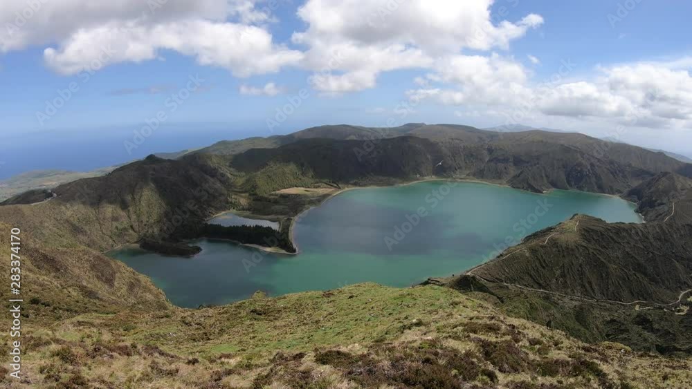 Spectacular panorama view over Lagoa do Fogo (Fire Lake) from Miradouro do Pico da Barrosa (Pico da Barrosa Viewpoint) on Sao Miguel Island, Azores, Portugal. Spectacular panorama view over Lagoa do Fogo (Fire Lake) from Miradouro do Pico da Barrosa (Pico da Barrosa Viewpoint) on Sao Miguel Island, Azores, Portugal.