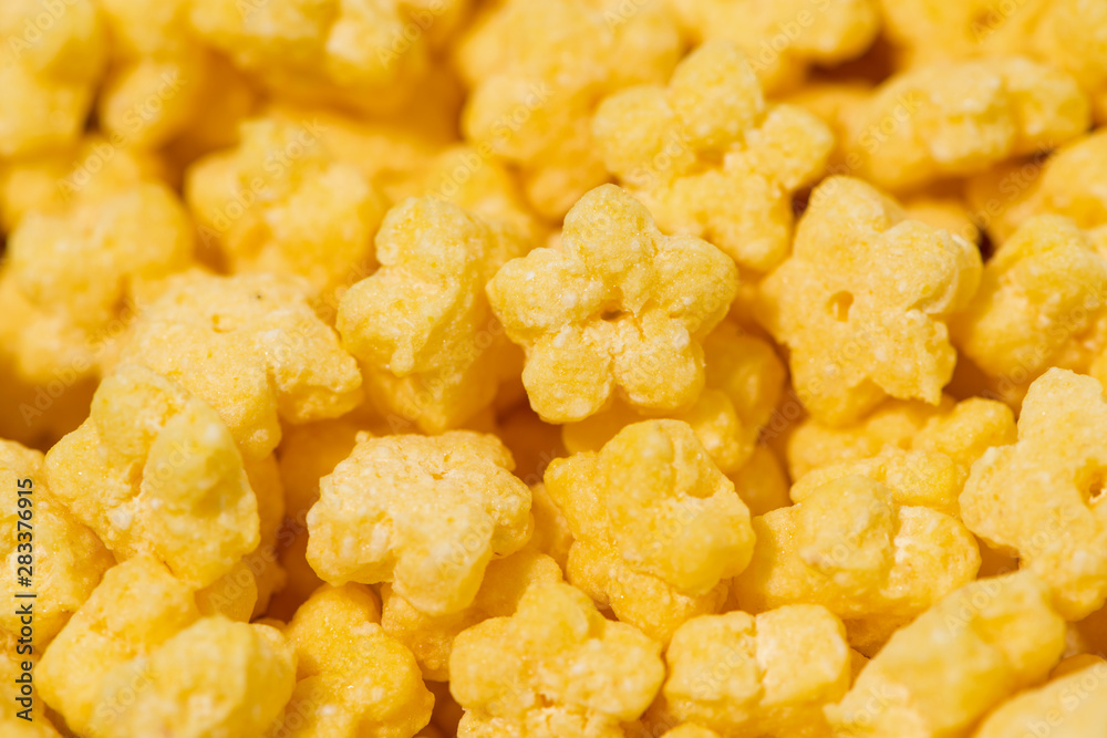 crispy stars - children's dry breakfast, closeup selective focus crispy stars - children's dry breakfast, closeup selective focus