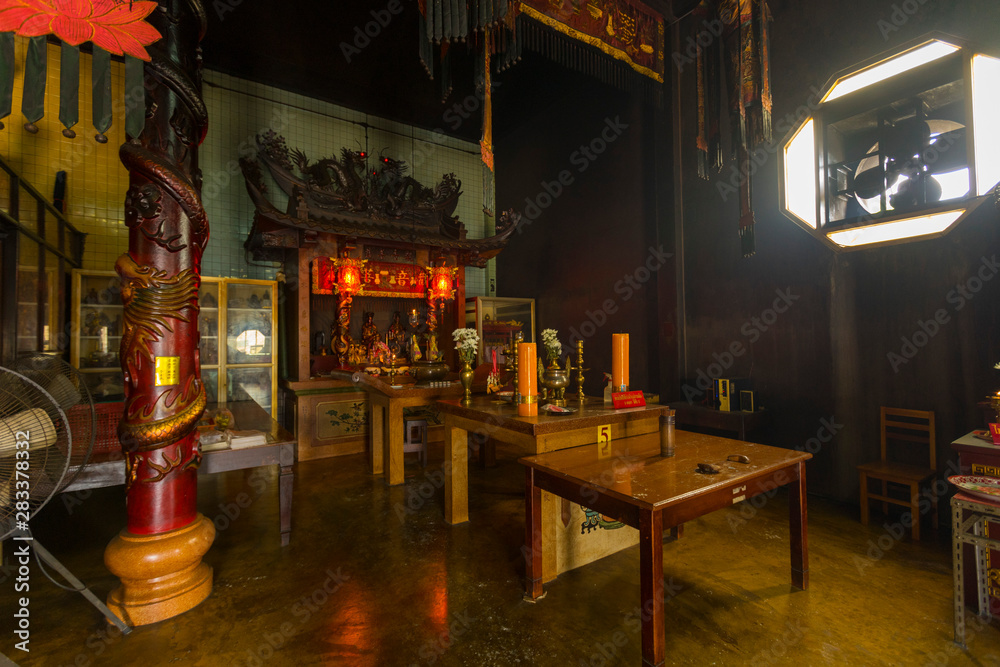 Interior view of Chaopho Muen Ram shrine located in city center of Trang, Thailand 