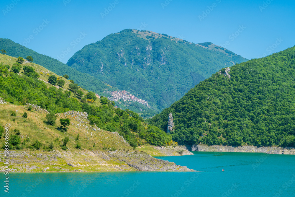 Panoramic sight in Castel di Tora with Lake Turano, beautiful village in the Province of Rieti. Lazio, Italy. Panoramic sight in Castel di Tora with Lake Turano, beautiful village in the Province of Rieti. Lazio, Italy.