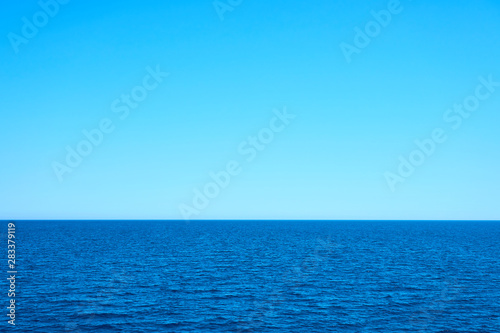 Tropical blue sea and clear blue sky horizon. Copy space.