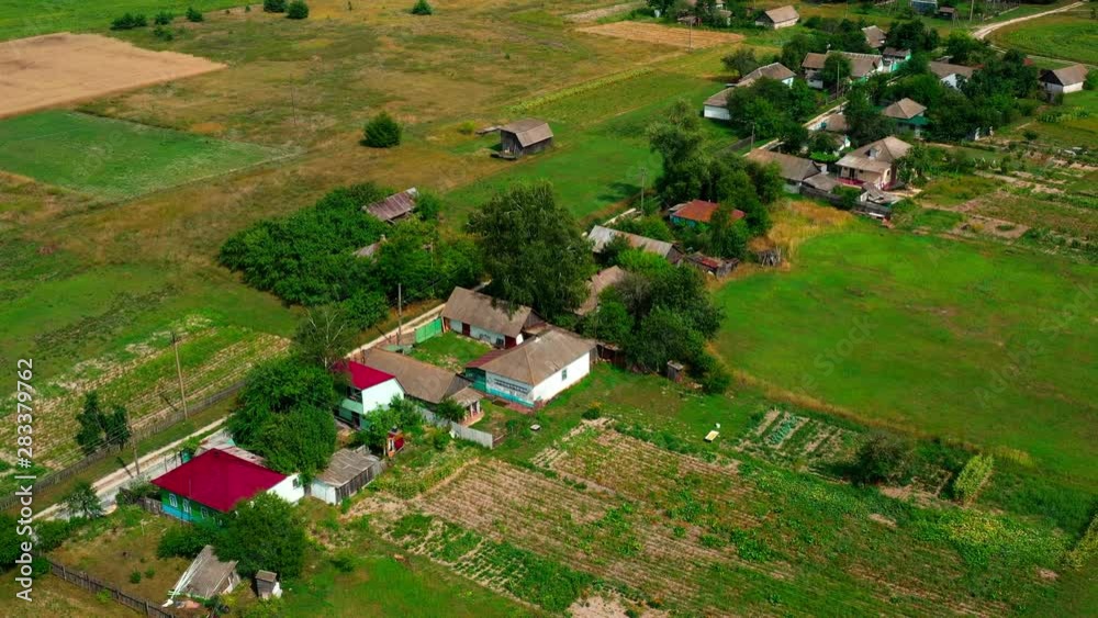4K Drone. Aerial view of Desna, an urban-type settlement in Kozelets Raion, Chernihiv Oblast in northern Ukraine. Shot on a bright summer day with blue sky and few clouds. 4K Drone. Aerial view of Desna, an urban-type settlement in Kozelets Raion, Chernihiv Oblast in northern Ukraine. Shot on a bright summer day with blue sky and few clouds.