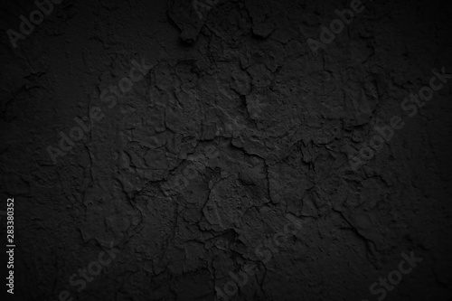 Dark textured and painted wall.