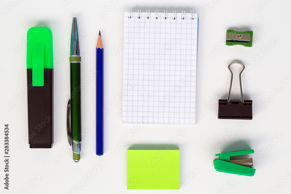 set of office stationery on a white background top view