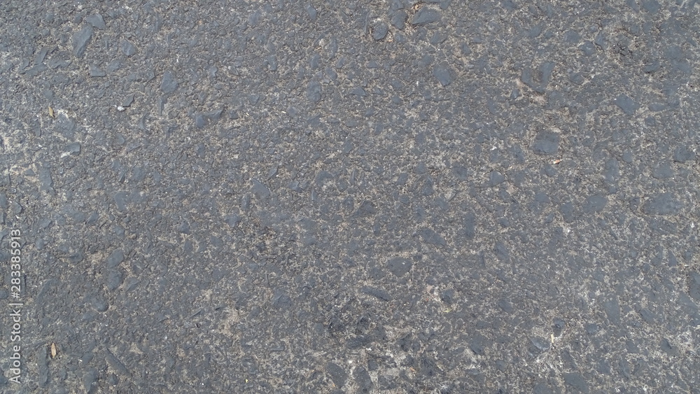 Textura de carretera de asfalto con tierra Textura de carretera de asfalto con tierra