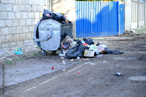  trash in the city © Vitaly Loz