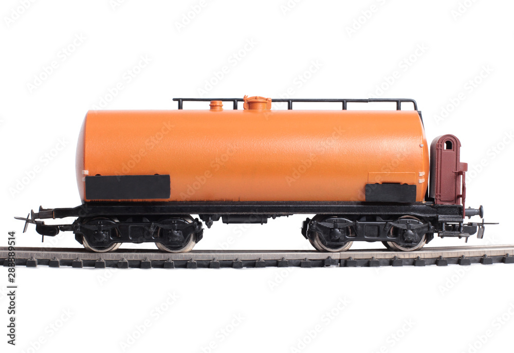 Fototapeta premium Model of a steam locomotive and cistern on rails on a white background
