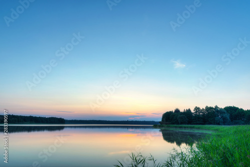 Fototapeta Naklejka Na Ścianę i Meble -  Sunrise over Szarek Lake. Masuria. Poland.