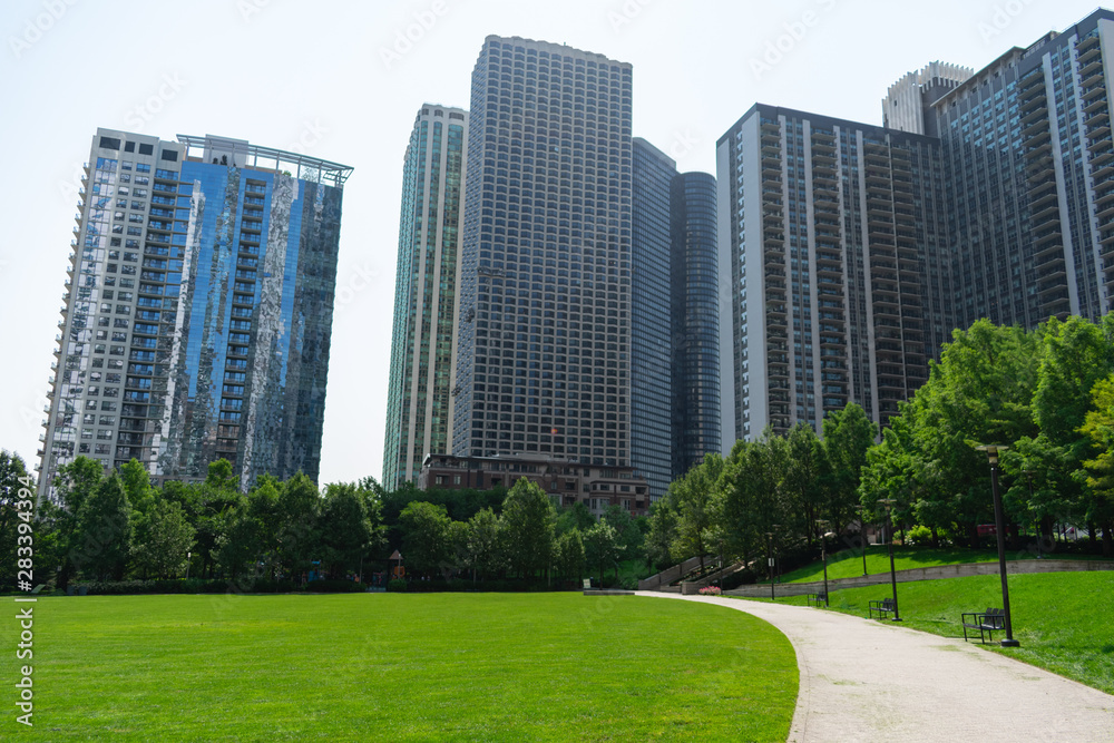 Path with Grass and Skyscrapers at the Lake Shore East Park in Chicago