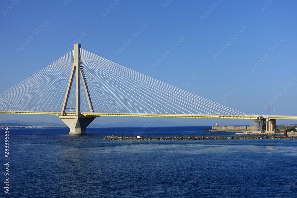 Fototapeta premium Famous modern anti seismic cable bridge of Rio Antirio Harilaos Trikoupis that connects Peloponnese to mainland Greece