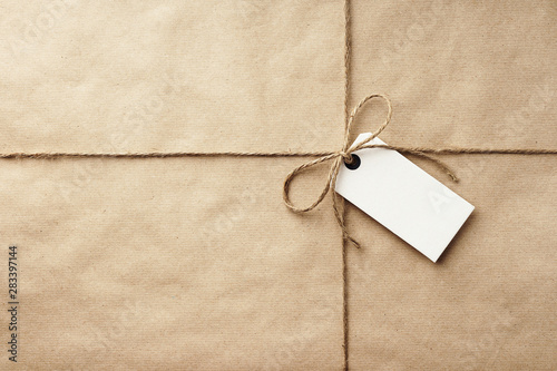 parcel - brown craft paper with twine & white label