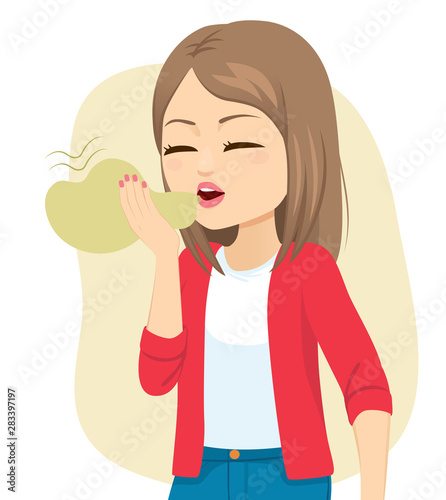 Young woman suffering halitosis bad breath health problem