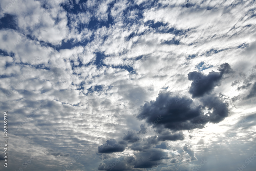 Obraz premium Dark blue sky with clouds for background or texture