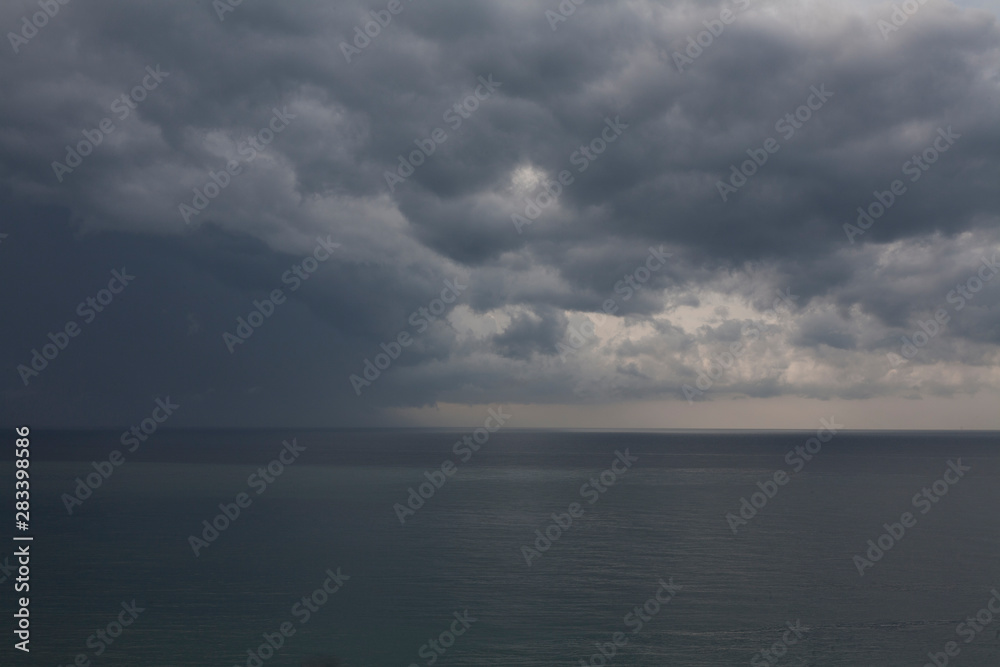 Distant storm off the coast of Sochi, Russia on the Black Sea.