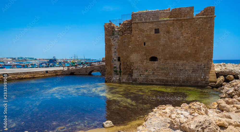 View of the castle in Paphos. Sightseeing In Cyprus. Medieval fortress in the Harbor. Cypriot museums. Mediterranean coast. Tourist attractions of Paphos. Travelling to Cyprus.