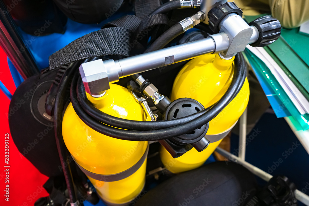 Industrial scuba diving for work under water. Diving equipment. Yellow