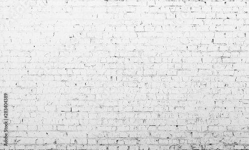 Abstract weathered white brick wall texture. Architecture detail abstract brick wallpaper.