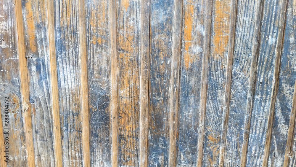 Grey and brown Wooden Door Planking Texture. Old Solid Wood Slats Rustic Shabby Gray Background. Hardwood Dark Weathered Timber Surface. Grunge Faded Wood Board Panel Structure, Close Up Grey and brown Wooden Door Planking Texture. Old Solid Wood Slats Rustic Shabby Gray Background. Hardwood Dark Weathered Timber Surface. Grunge Faded Wood Board Panel Structure, Close Up