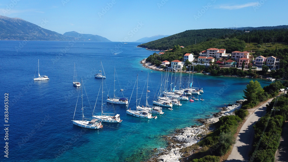 Fototapeta premium Aerial drone photo of picturesque and iconic port of Fiskardo with luxury boats docked and traditional character, Cefalonia island, Ionian, Greece