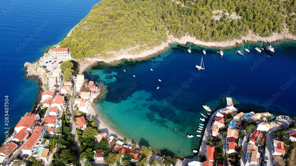 Aerial drone bird's eye view photo of beautiful and picturesque colorful traditional fishing village of Assos in island of Cefalonia, Ionian, Greece