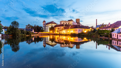 Jindrichuv Hradec Castle by night. Reflection in the water. Czech Republic © pyty