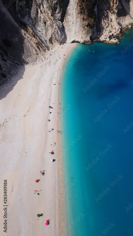 Aerial drone photo of iconic turquoise and sapphire bay and beach of Myrtos, Cefalonia island, Ionian, Greece