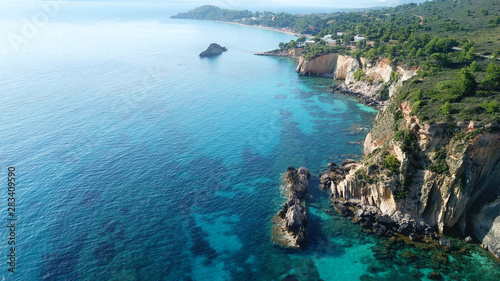 Aerial drone photo of iconic white rock cliffs and volcanic formations near famous beach of Platys and Makrys gialos with turquoise clear sea, Argostoli, Cefalonia island, Ionian, Greece