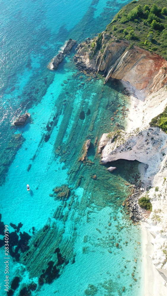 Aerial drone photo of tropical caribbean turquoise bay with large volcanic white cliffs and beautiful emerald sea Aerial drone photo of tropical caribbean turquoise bay with large volcanic white cliffs and beautiful emerald sea