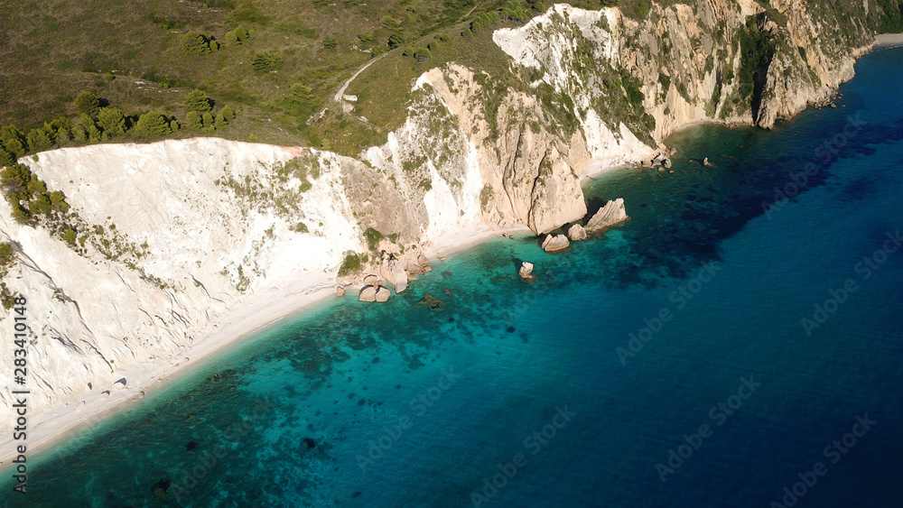 Aerial drone photo of iconic white rock cliffs and volcanic formations near famous beach of Platys and Makrys gialos with turquoise clear sea, Argostoli, Cefalonia island, Ionian, Greece Aerial drone photo of iconic white rock cliffs and volcanic formations near famous beach of Platys and Makrys gialos with turquoise clear sea, Argostoli, Cefalonia island, Ionian, Greece