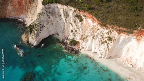 Aerial drone photo of iconic white rock cliffs and volcanic formations near famous beach of Platys and Makrys gialos with turquoise clear sea, Argostoli, Cefalonia island, Ionian, Greece photo