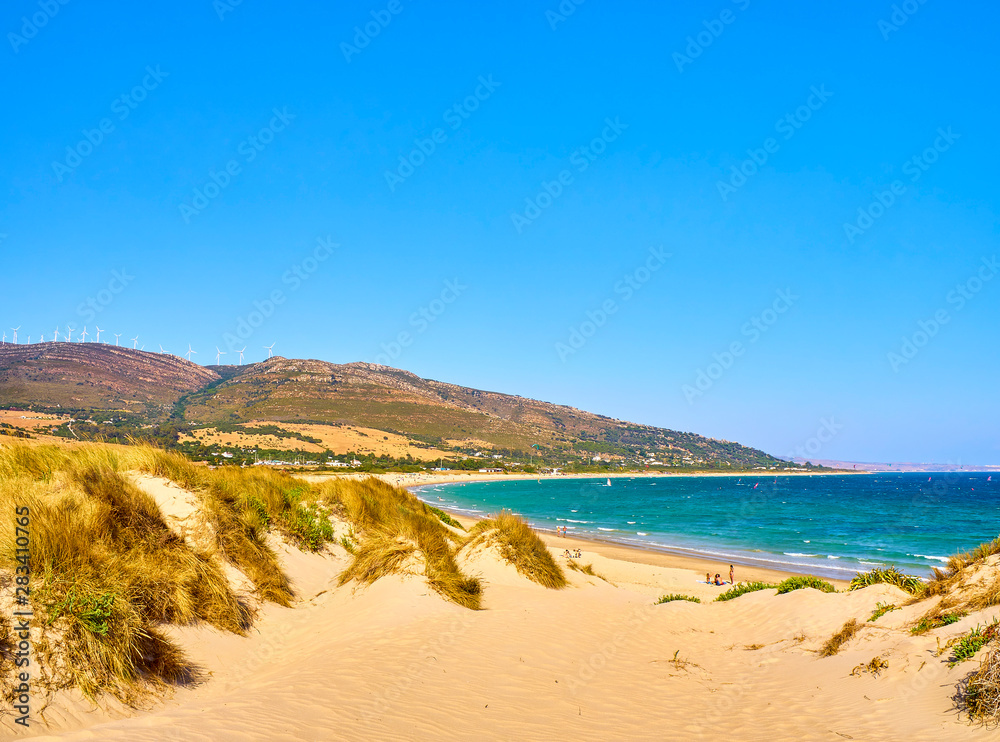 Punta Paloma beach, a unspoiled white sand beach of The Nature Park del Estrecho. Valdevaqueros inlet. Tarifa, Cadiz. Andalusia, Spain.