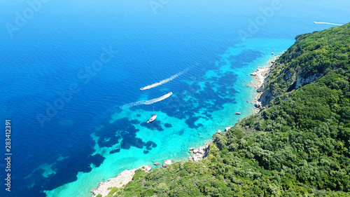 Aerial drone view of iconic small island of Marathonisi featuring clear turquoise water sandy shore and natural hatchery of Caretta-Caretta sea turtles  Zakynthos island  Ionian  Greece