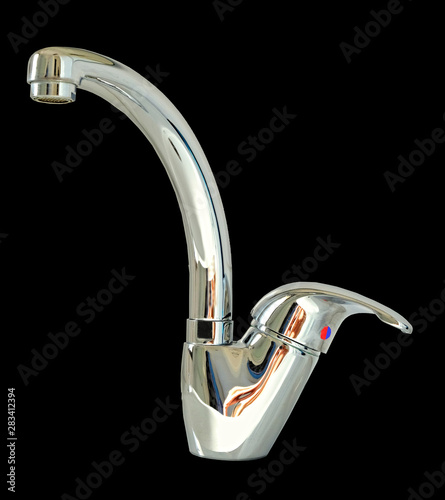 Modern water tap made in the form of a chrome-plated monoblock f