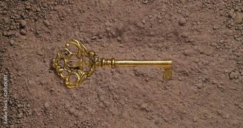 Finding an old gold skeleton key - Discovering success concept