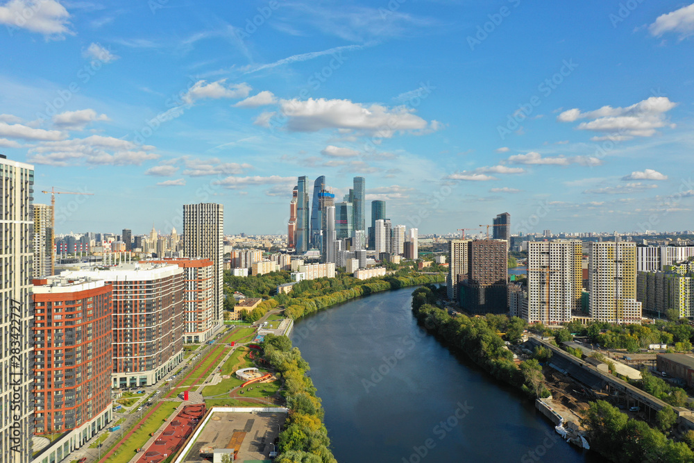 Moscow, Russia. Aerial view of Moscow business center skyscrapers, Moscow River and modern residential buildings