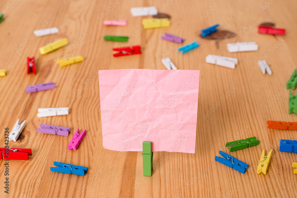 Colored clothespin papers empty reminder wooden floor background office