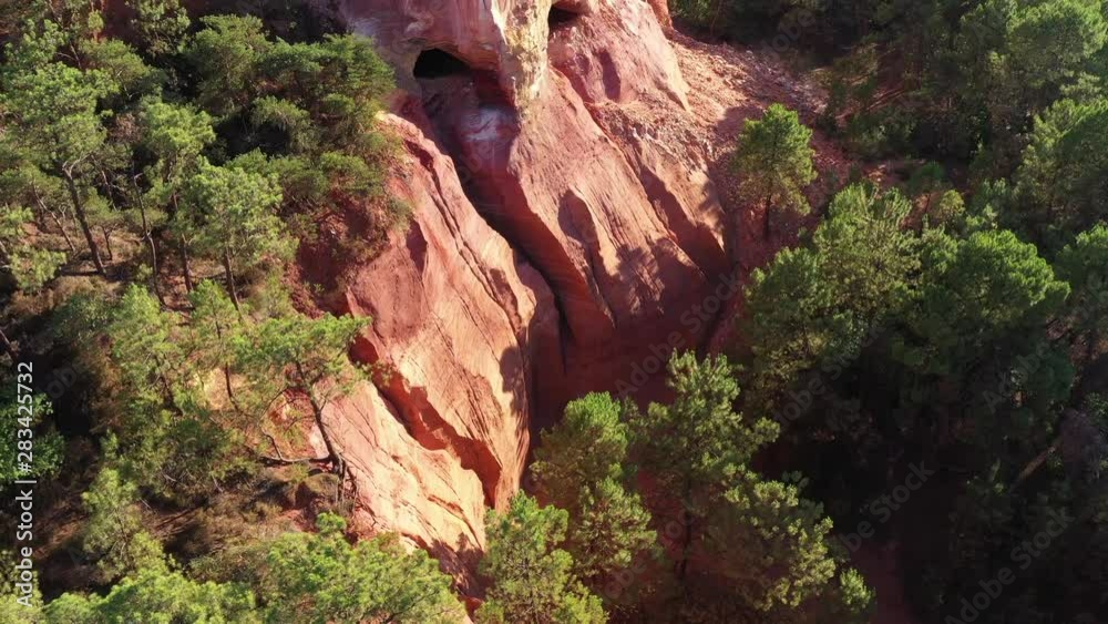 Canyon Roussillon ochre pigments clay aerial shot sunny day France Vaucluse
