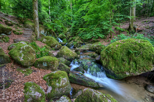 Wild romantic hiking trail along famous Gertelbach waterfalls, Black Forest, Germany