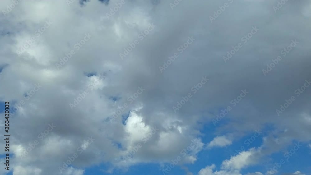 Time Lapse: Clouds Float Peacefully Through Blue Sky Time Lapse: Clouds Float Peacefully Through Blue Sky