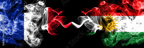 France vs Kurdistan, Kurdish smoky mystic flags placed side by side. Thick colored silky abstract smoke banner of French and Kurdistan, Kurdish photo