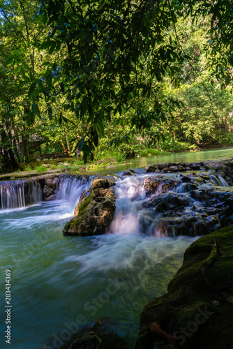 Fototapeta Naklejka Na Ścianę i Meble -  Waterfall in deep tropical rainforest with green tree