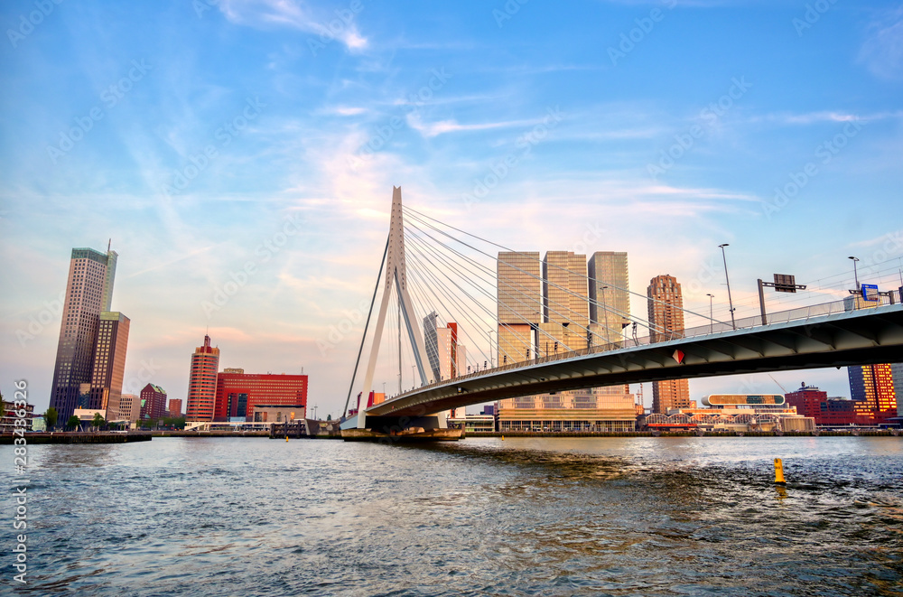A view of the Erasmusbrug (Erasmus Bridge) which connects the north and south parts of Rotterdam, the Netherlands. A view of the Erasmusbrug (Erasmus Bridge) which connects the north and south parts of Rotterdam, the Netherlands.