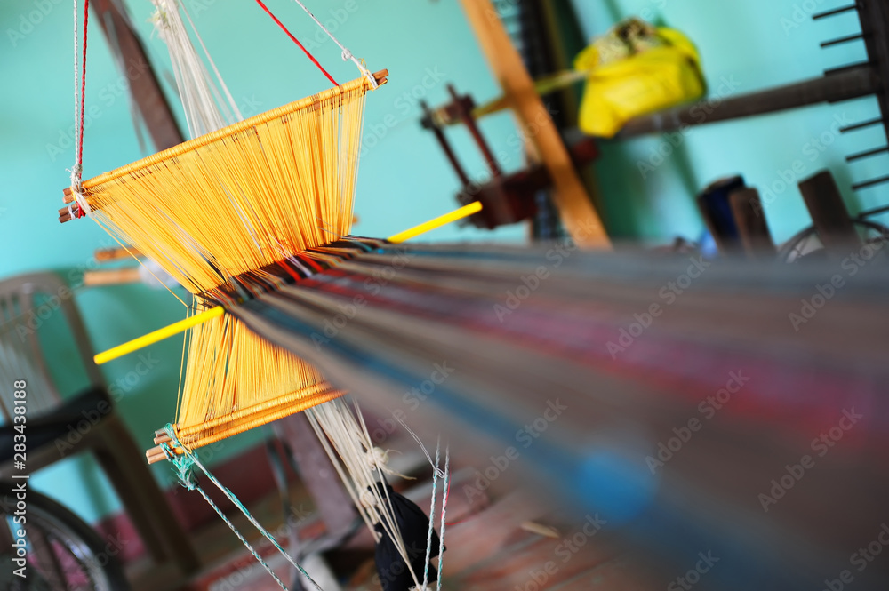 Simple weaving looms of the craft village in Vietnam